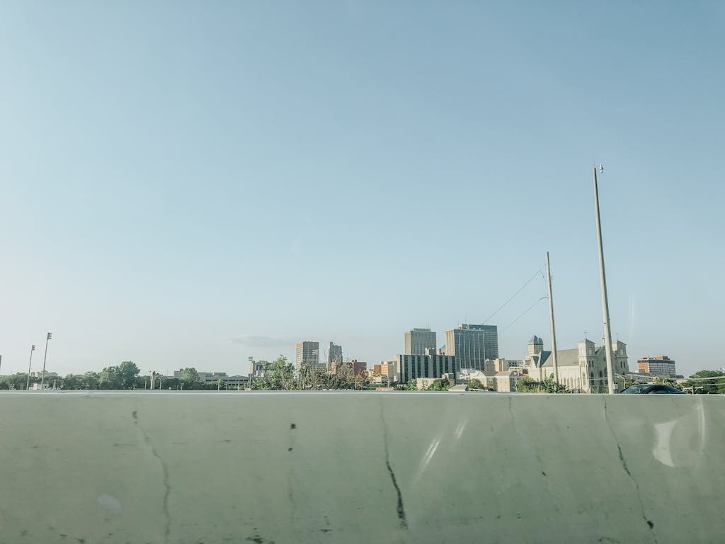 Lewis Center, Ohio Champion Trees Scenic view of downtown Dayton skyline under a clear blue sky, ideal for urban landscapes.