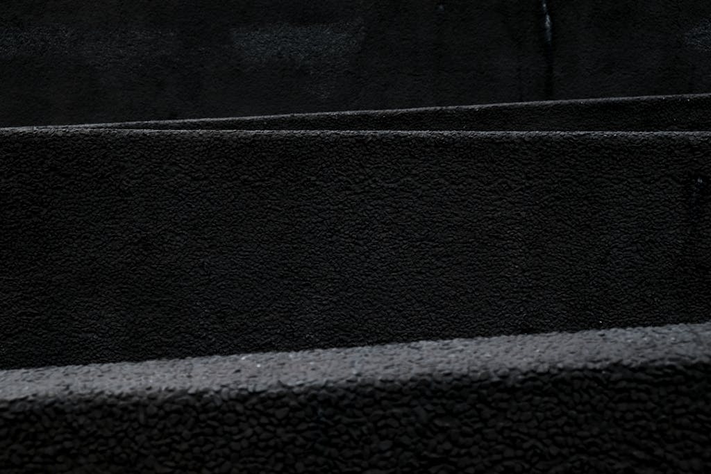 Sotwe A dark and minimalist black texture pattern ideal for backgrounds and design use.