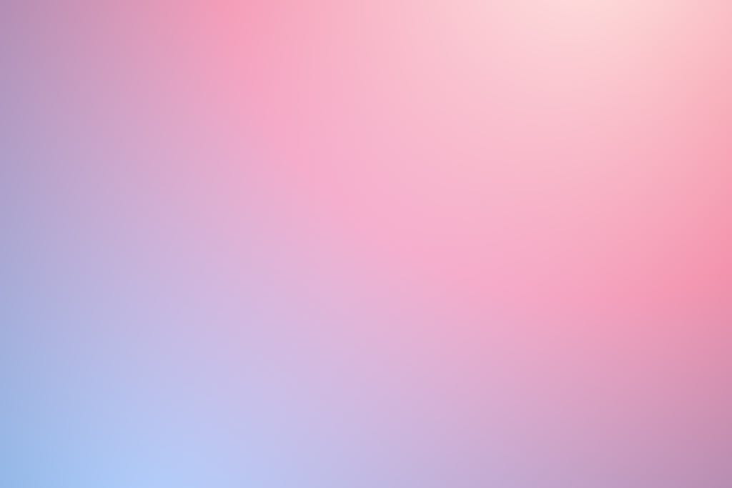 Newtopy A soothing soft pastel gradient featuring pink and blue hues, ideal for backgrounds.