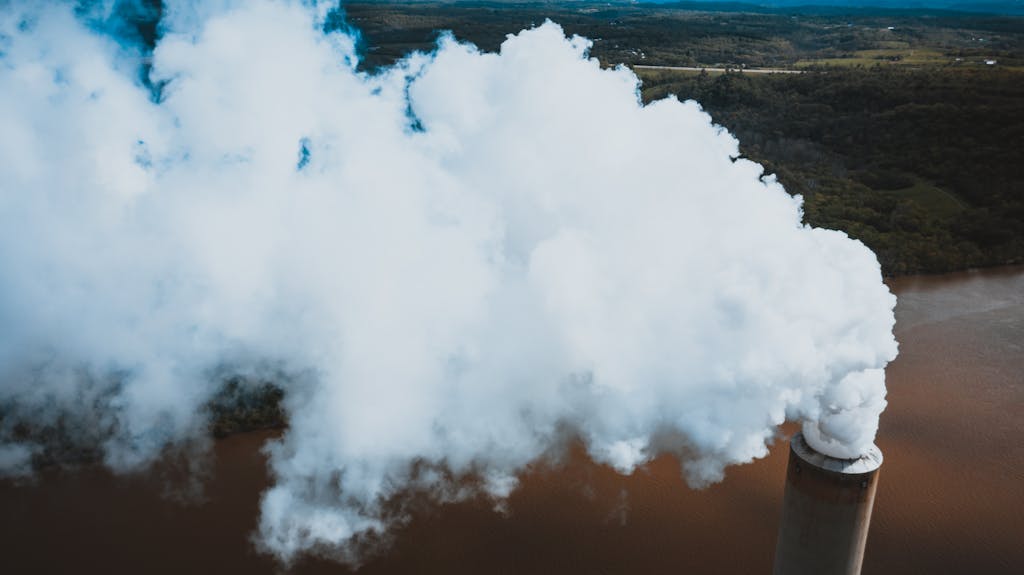 Ohio Champion Trees Lewis Center OhioFrom above of thick fume stream coming out of masonry smokestack at power plant